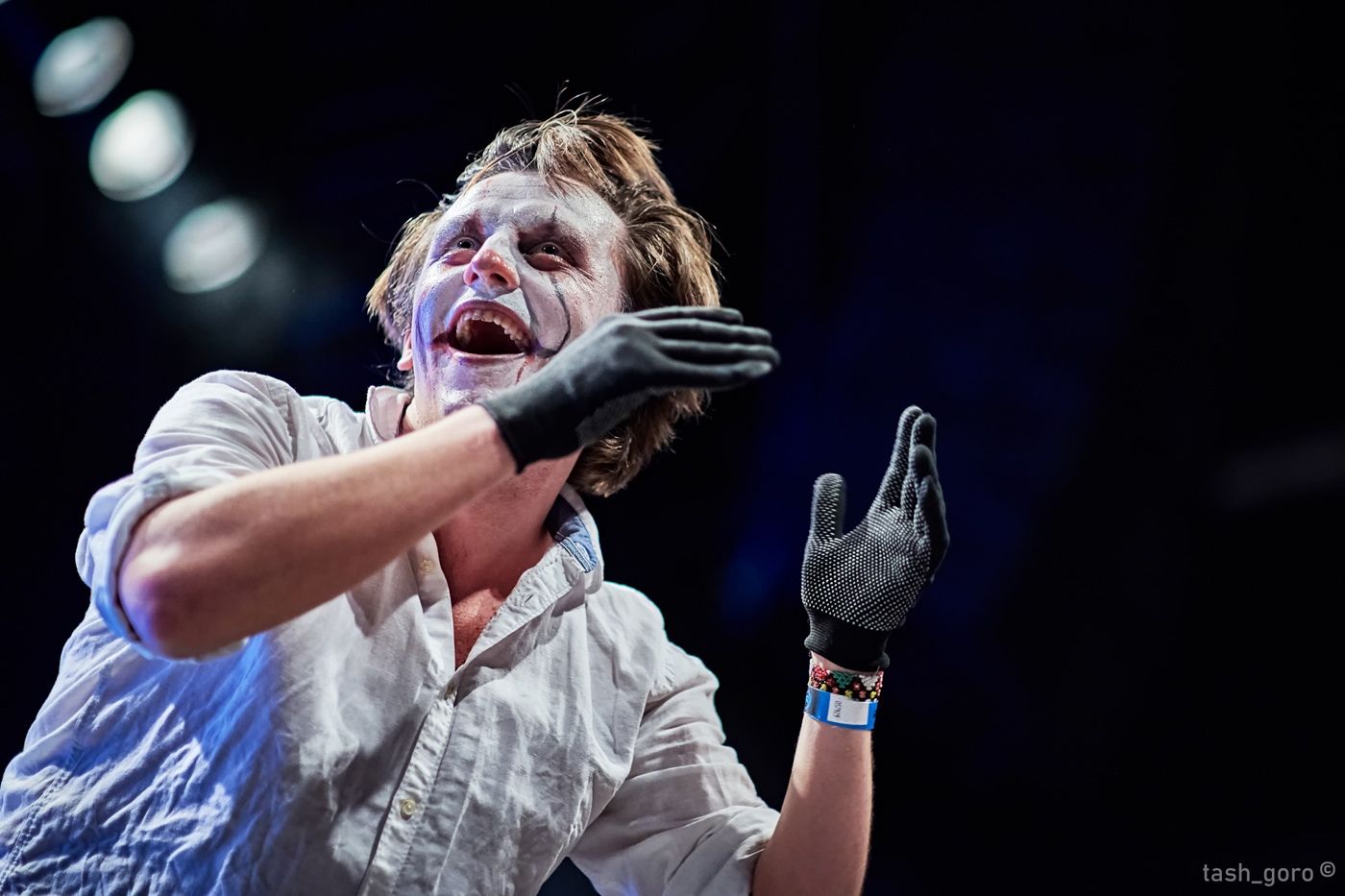 Sergey Akimov conducting a theatrical RockestraLive performance with face paint
