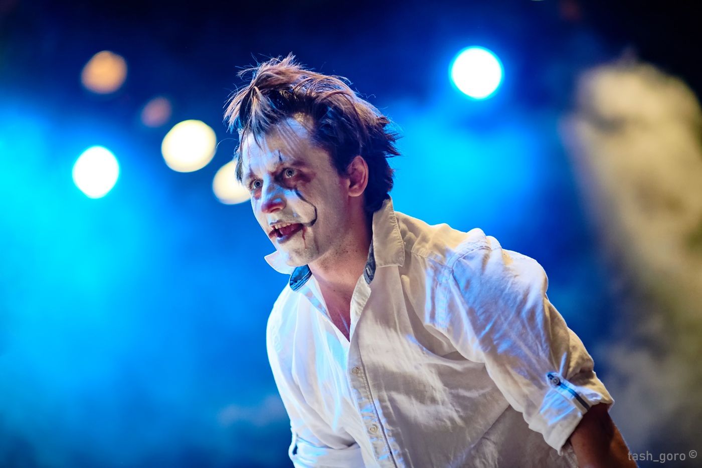 Sergey Akimov in theatrical stage make-up conducting RockestraLive