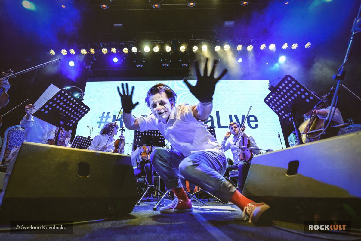 Sergey Akimov in theatrical concert make-up during a RockestraLive show